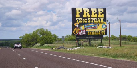 roadside billboard for The Big Texan